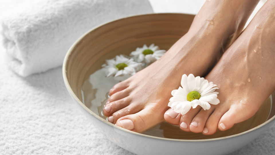 foot-care-after-injury-soak-your-feet-in-cold-water-stock-photo